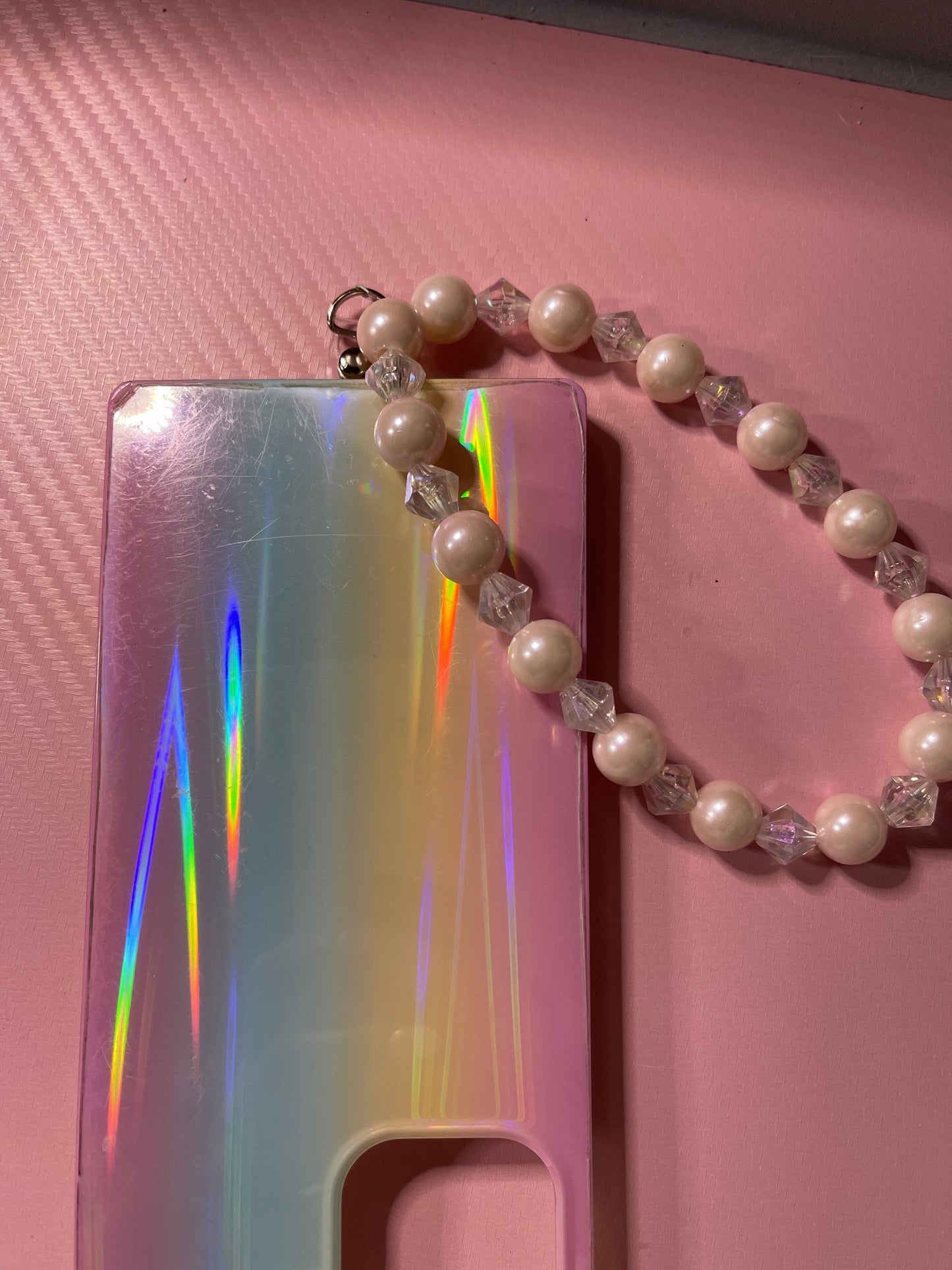 Sitting Pink Phone Strap